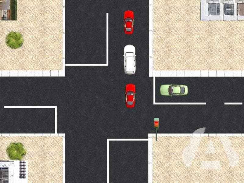 Ha quedado detenido en una intersección regulada por semáforos y obstaculiza la…